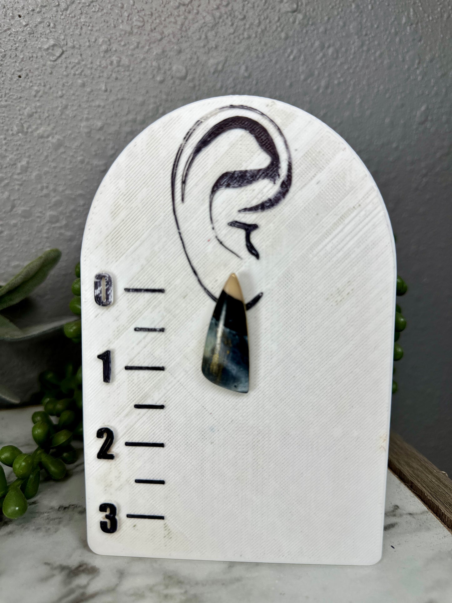 Stone Effect Triangle Statement Studs